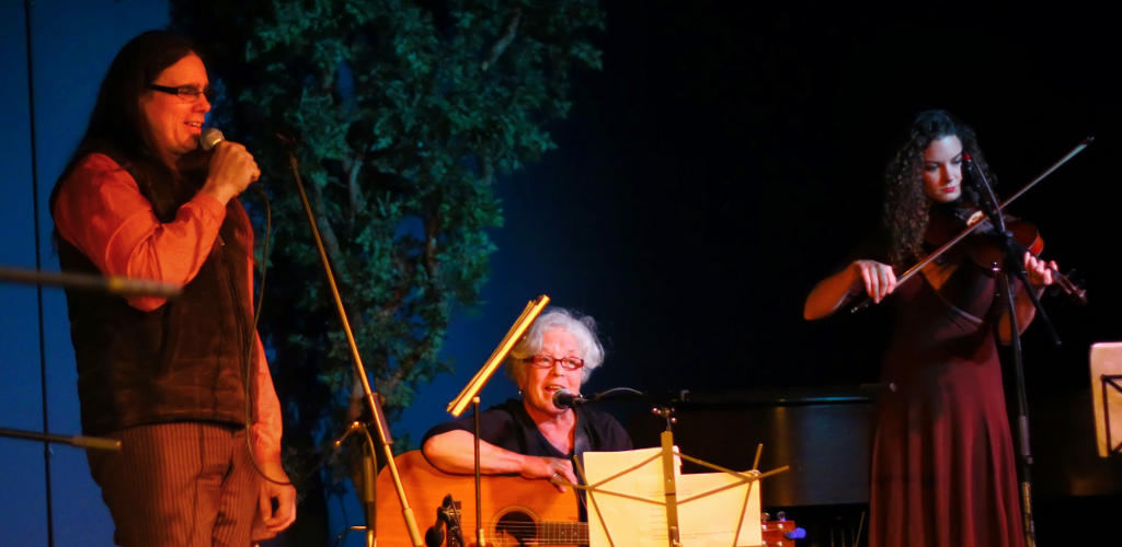 Shawn McBurnie singing with Sherry Minnick and Kerri Joy on fiddle